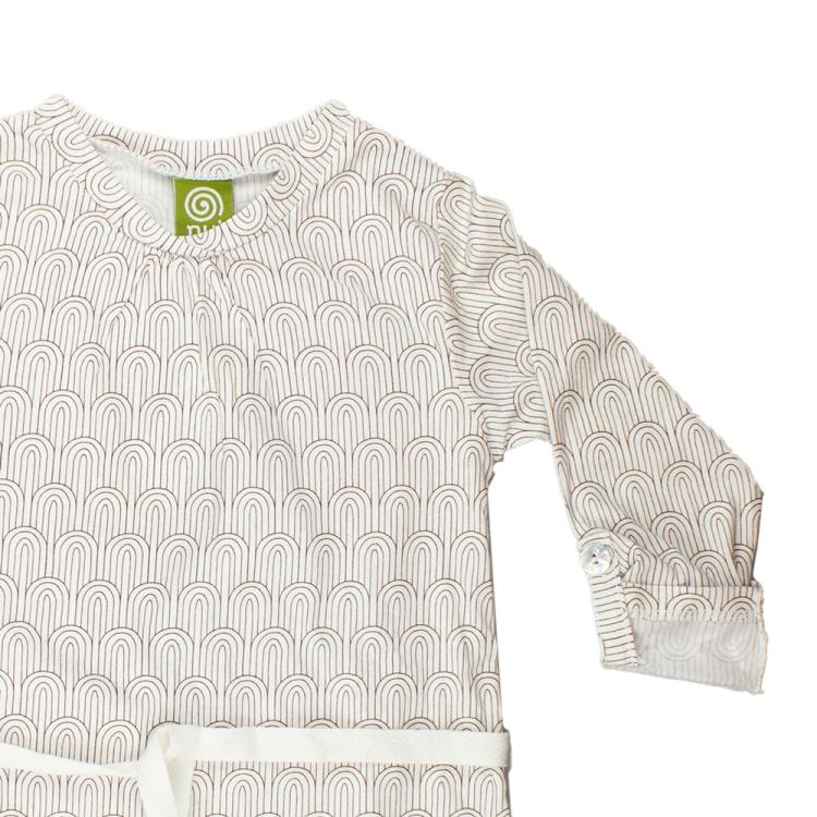 Nui Organics. Jerseykjole i brun mønstret økologisk bomuld, udsnit