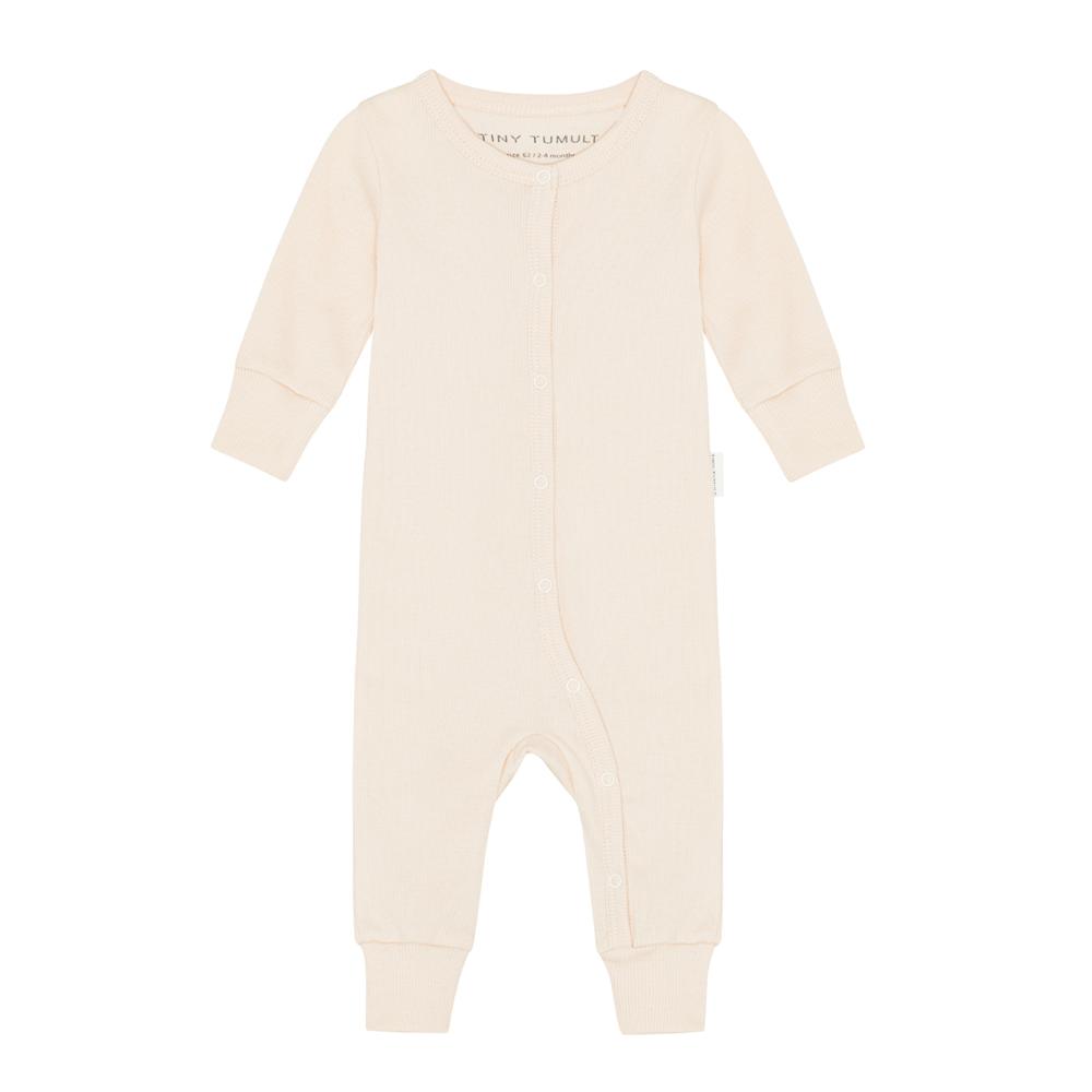 Tiny Tumult, heldragt Ecru